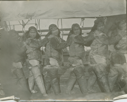 Image of Six Inuit women in dance line, aboard